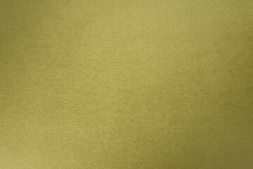 Bright olive green tone color paint on blank recycled cardboard box paper texture background with space minimal style 