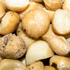 Macadamia nuts peeled.Macadamia nuts from Australia.Macadamia is a genus of woody plants in the Proteaceae family.