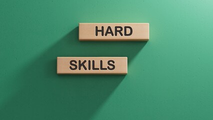 Hard skills symbol. Wooden blocks with words Hard skills. Business and Hard skills concept. Copy space.3D rendering on green background.