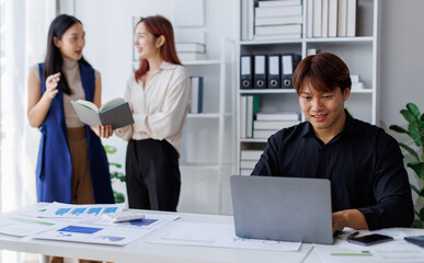 Brainstorming Collaboration and  successful partnership analysis by Team of Young business Asian people working in an office workspace