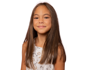 Portrait of a beautiful smiling brunette child girl looking at camera isolated over transparent background. PNG transparent.