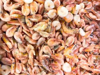 A pile of shrimp and shrimp tails