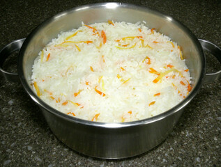 Cook healthy rice with vegetables. A close-up shot of a cooking scene.


