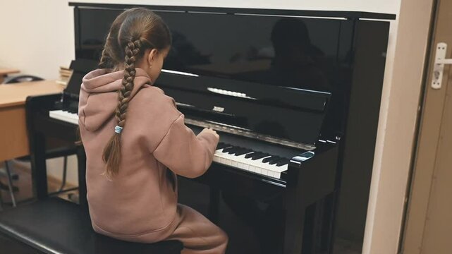 Child explores piano basics, first notes played with curiosity and excitement, music journey begins as creativity awakens, early lessons fostering lifelong love for music