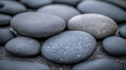 Natural smooth pebbles coastal beach high-quality image outdoor setting close-up serenity in nature