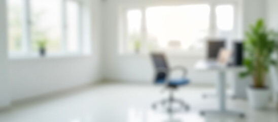 Bright modern office blurred background space with white walls desks chairs computers natural light from windows minimalistic interior design clean workspace professional environment