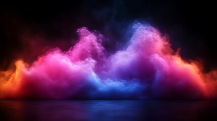 Colorful smoke clouds on dark background.