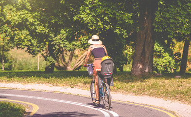 Cyclist ride on the bike path in the city Park
