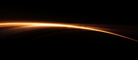 Curved golden light beam diagonally illuminating a dark background with smooth gradients creating a captivating abstract visual effect
