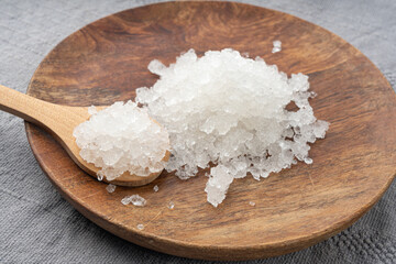 Dead sea salt pile, white crystals for body spa, sodium chloride similar to crushed ice, spa scrub