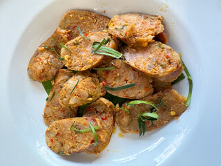 Sai Ua or Chiang Mai Sai Ua is a grilled pork sausage from northern Thailand. Breakfast in Northern Thailand