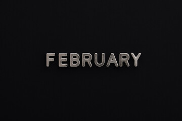 The word February in English is made of silver metallic letters on a black background