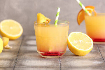 Glass of tasty mai tai cocktail on table