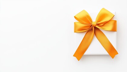 A beautifully wrapped white gift box adorned with a vibrant orange bow on a clean surface