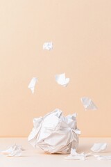 Struggling with motivation while studying can lead to frustration as shown by crumpled paper symbolizing attempts and setbacks