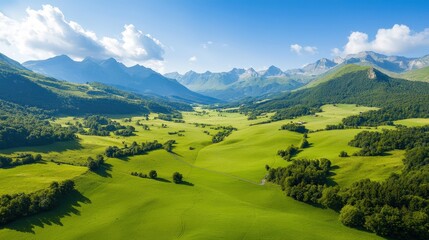 Obraz premium Scenic Mountain Landscape with Lush Green Meadows