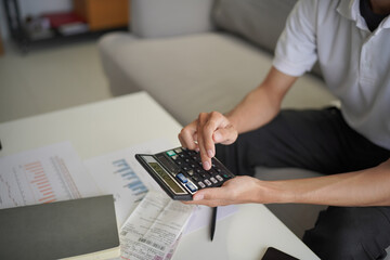 Fototapeta premium Man planning finance for insurance, loan real estate or property.