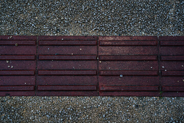 a Top texture view of red Braille block, tactile paving for blind handicap. Perfect for graphic...