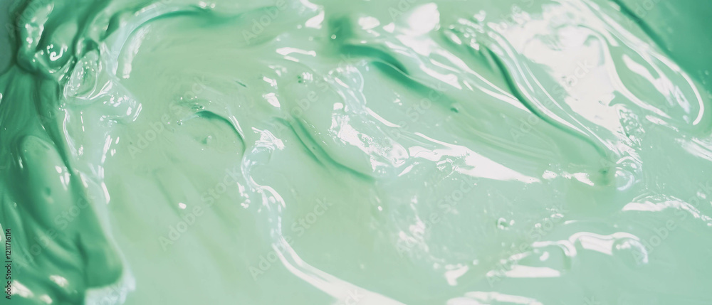 Poster Smooth texture of green paint with varied shades displayed on a surface