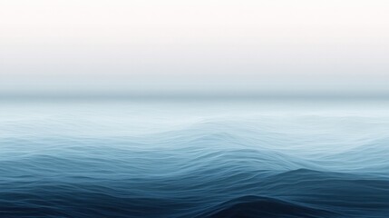 Obraz premium Calm ocean waves under a hazy sky; serene seascape, perfect for travel or nature websites