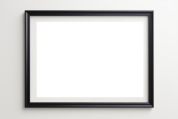blank black picture frame on white wall with clipping for text