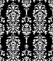 Fototapeta premium A black and white damask pattern featuring intricate floral designs.
