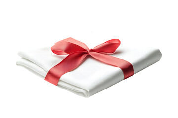 A folded white napkin with a red ribbon, cut out. Isolated on transparent or white background