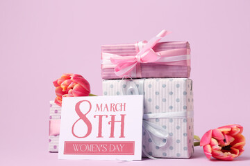 Composition with tulip flowers, gift boxes and greeting card for Women's Day celebration on pink background