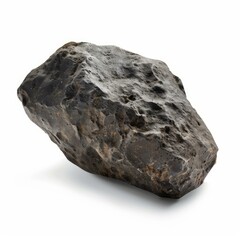 Fototapeta premium Basalt rock with rough texture isolated on white background, ideal for geology or construction projects