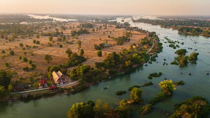  Drone Landscape, establishing at 4000 Islands Laos, Mekong River, reflected below Sunset travel...