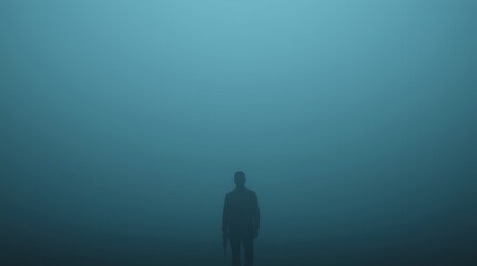 Obraz premium Silhouette of a man in dense fog, evoking mystery.
