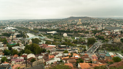 Tbilisi old town aerial panoramic view. Tbilisi is the capital and the largest city of Georgia, lying on the banks of the Kura River. © Gokhan