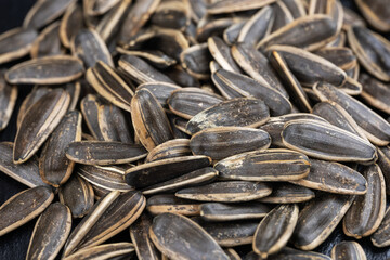 Gray sunflower seeds. Top view. Background, texture