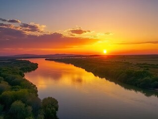 Obraz premium Sunset over river valley, vibrant colors, calm water, aerial view, landscape photography