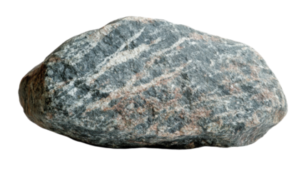 A smooth, colorful rock resting on a soft surface under natural light in a tranquil outdoor setting