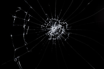 cracks on the glass impact on the glass, abstract background broken window damage
