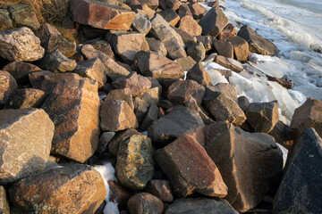 winter landscape, rocky sea shore with ice