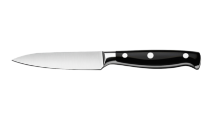 A sleek kitchen knife gleaming under soft light on a wooden countertop during meal preparation