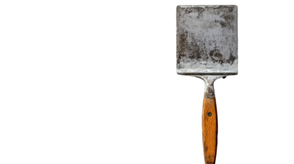 Rustic artistry with a weathered spatula on a minimalist background showcasing craftsmanship