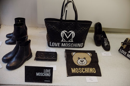 Love Moschino accessories displayed in a shop window