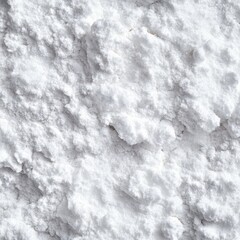 Obraz premium A textured view of soft and fluffy white powder, resembling sugar or flour, captivating in its simplicity.