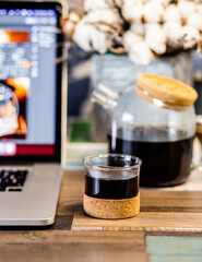 cup of coffee with teapot