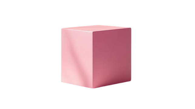 A soft pink cube placed on a minimalist surface illuminated by gentle light during the day