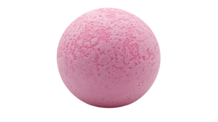 A pink bath bomb on a smooth surface, ready to make bath time joyful