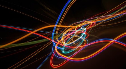 Abstract Light Trails: A mesmerizing dance of vibrant light streaks across a dark canvas, creating an ethereal and dynamic abstract composition. The colors are intense and saturated.