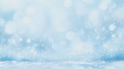 Fototapeta premium Serene Winter Wonderland: A captivating blue backdrop of shimmering snow and sparkling bokeh lights conjures a sense of tranquility and festive cheer. The abstract.