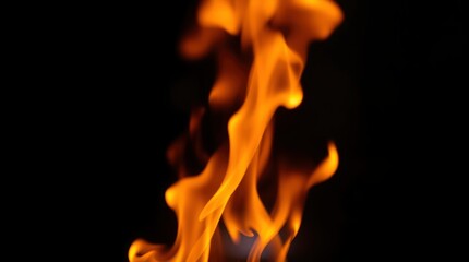 Fototapeta premium Fiery Abstract: Dancing Flames Against Dark Background