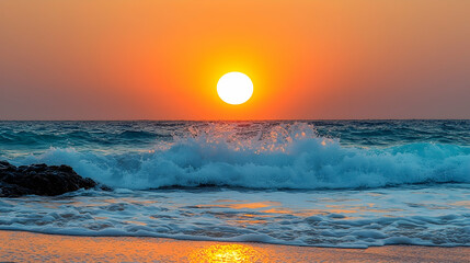 Obraz premium Vibrant sunset over ocean waves crashing on sandy beach