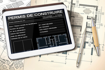 PERMIS DE CONSTRUIRE, BUILDINGS PERMIT CONCEPT ON DIGITAL TABLET - Residential building design, building activity and construction industry - French Language concept