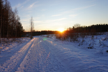 A snow covered country road